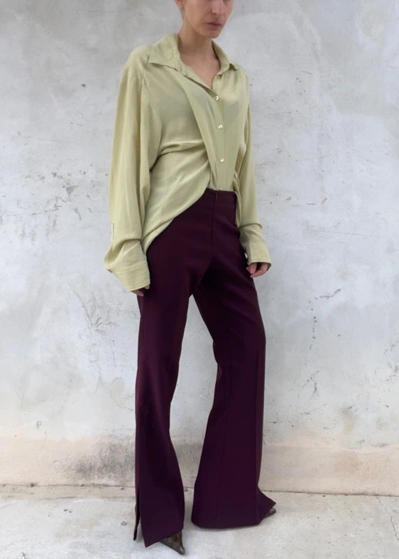 Pantaloni con spacco