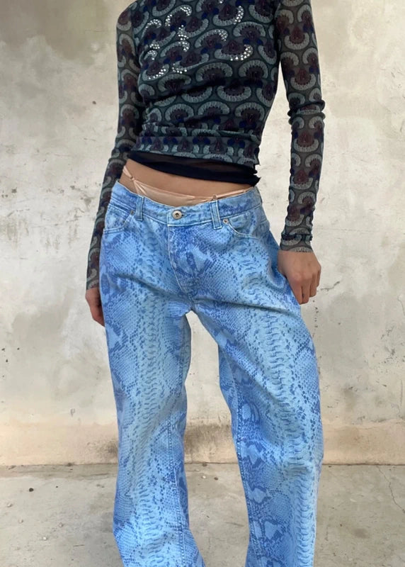 Pantaloni stampa pitone Guess