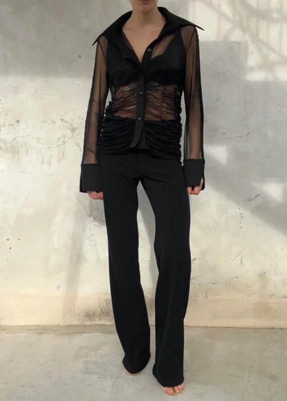 Camicia semitrasparente con vita arricciata