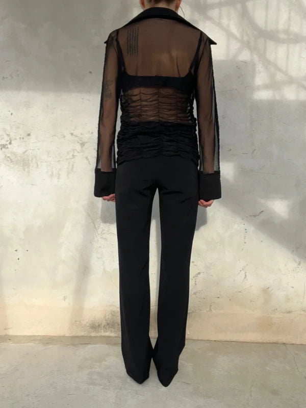 Camicia semitrasparente con vita arricciata