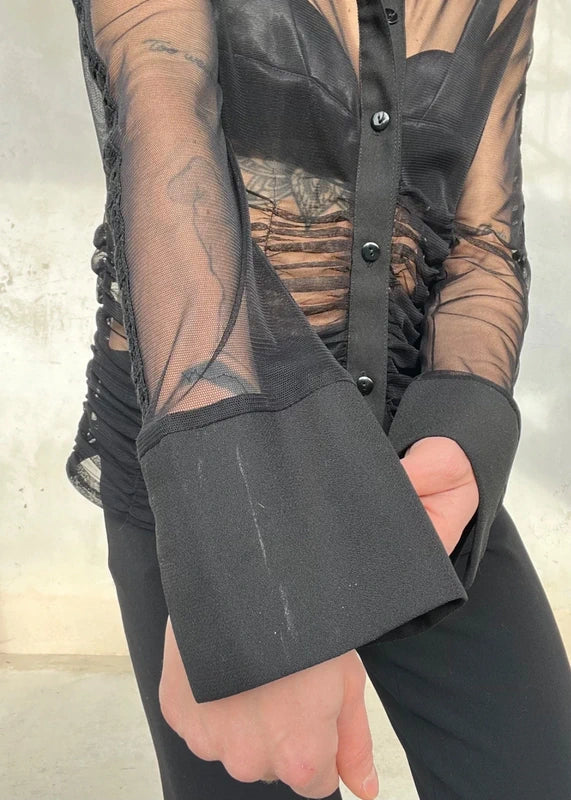 Camicia semitrasparente con vita arricciata
