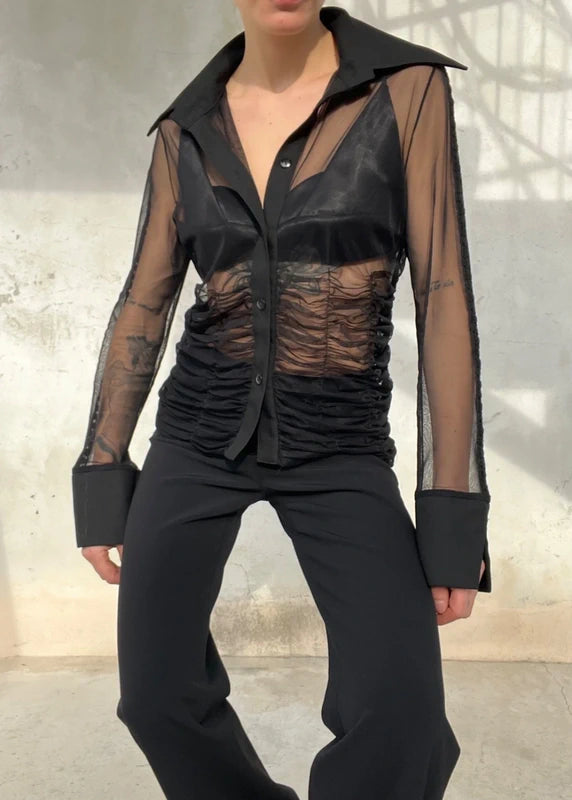 Camicia semitrasparente con vita arricciata