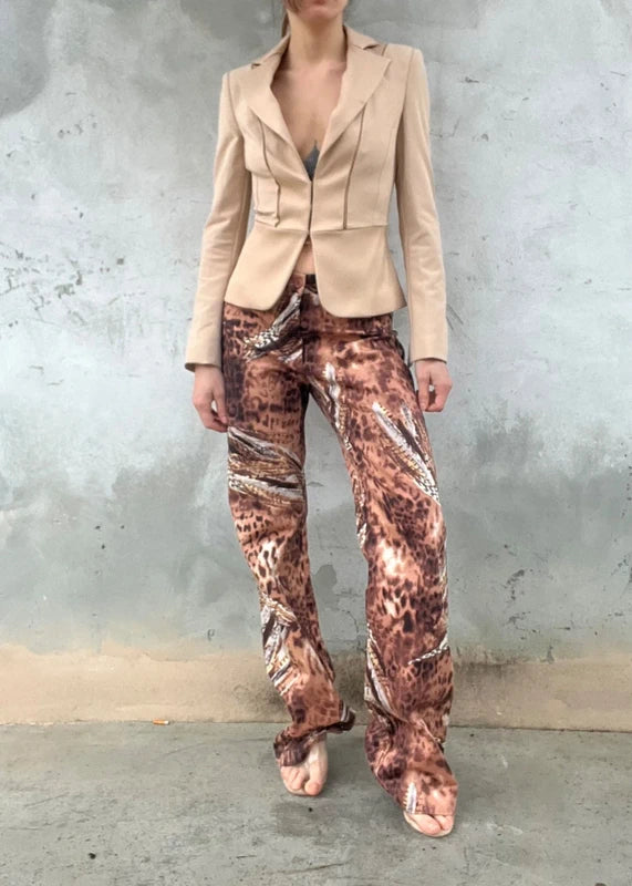 Pantaloni animalier con stampa piume