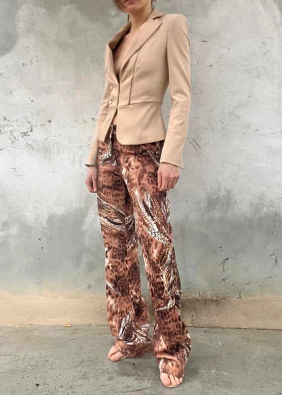 Pantaloni animalier con stampa piume