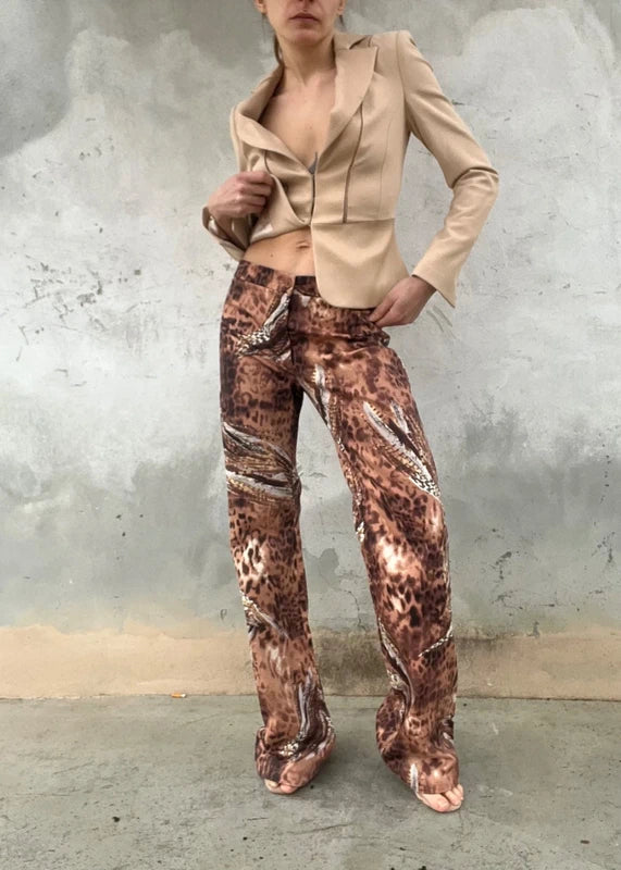 Pantaloni animalier con stampa piume