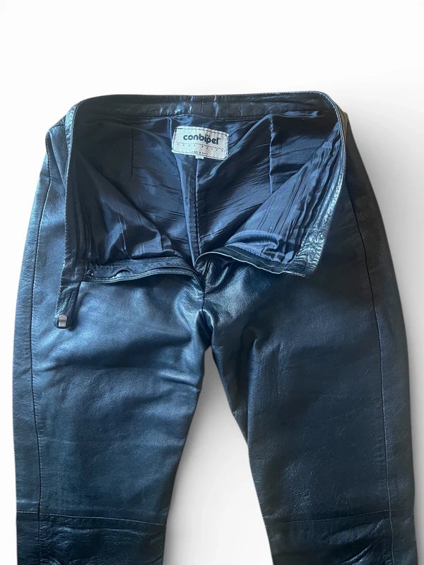 Pantaloni in pelle neri con tasche a filetto