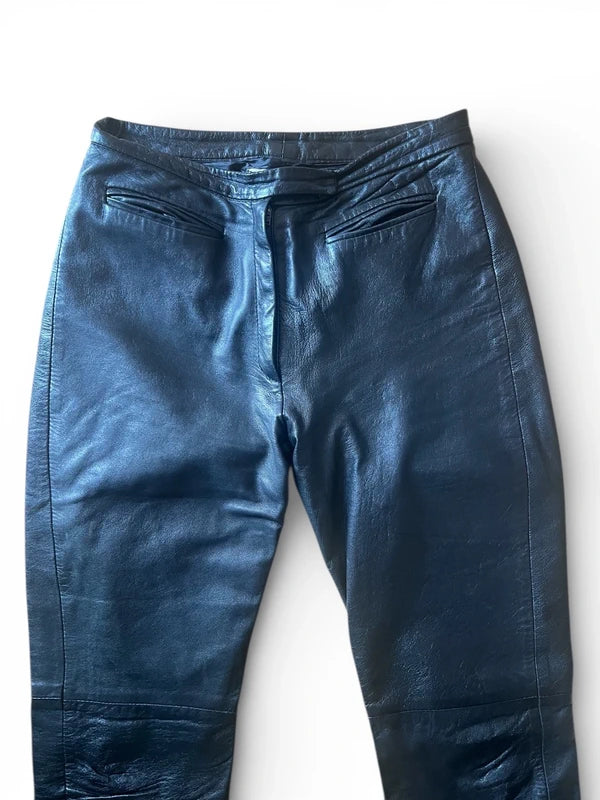Pantaloni in pelle neri con tasche a filetto