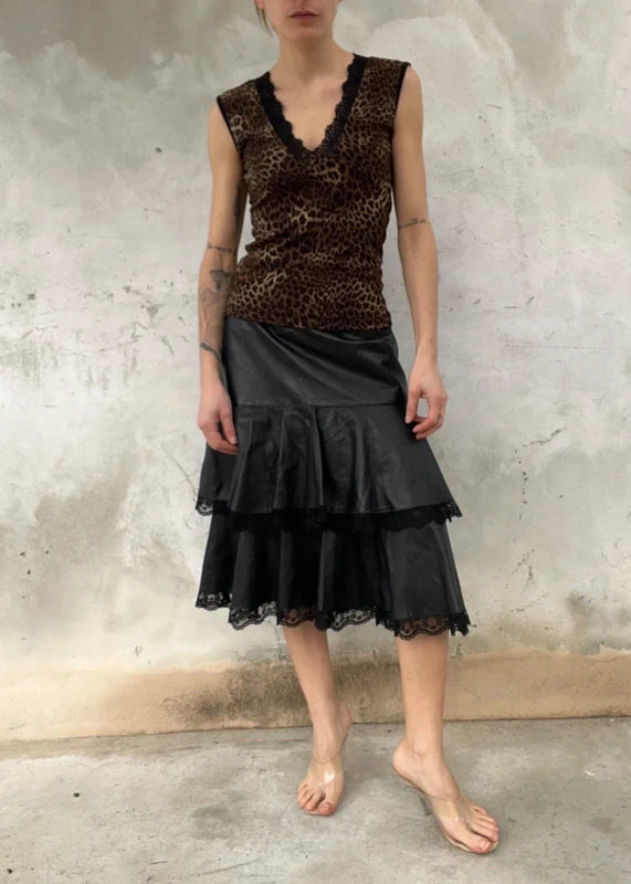 Gonna vera pelle con bordo pizzo