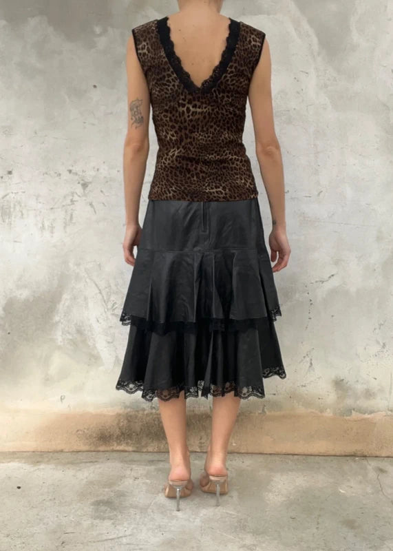 Gonna vera pelle con bordo pizzo