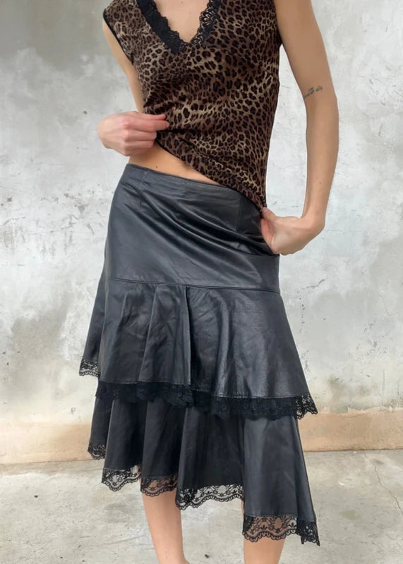 Gonna vera pelle con bordo pizzo