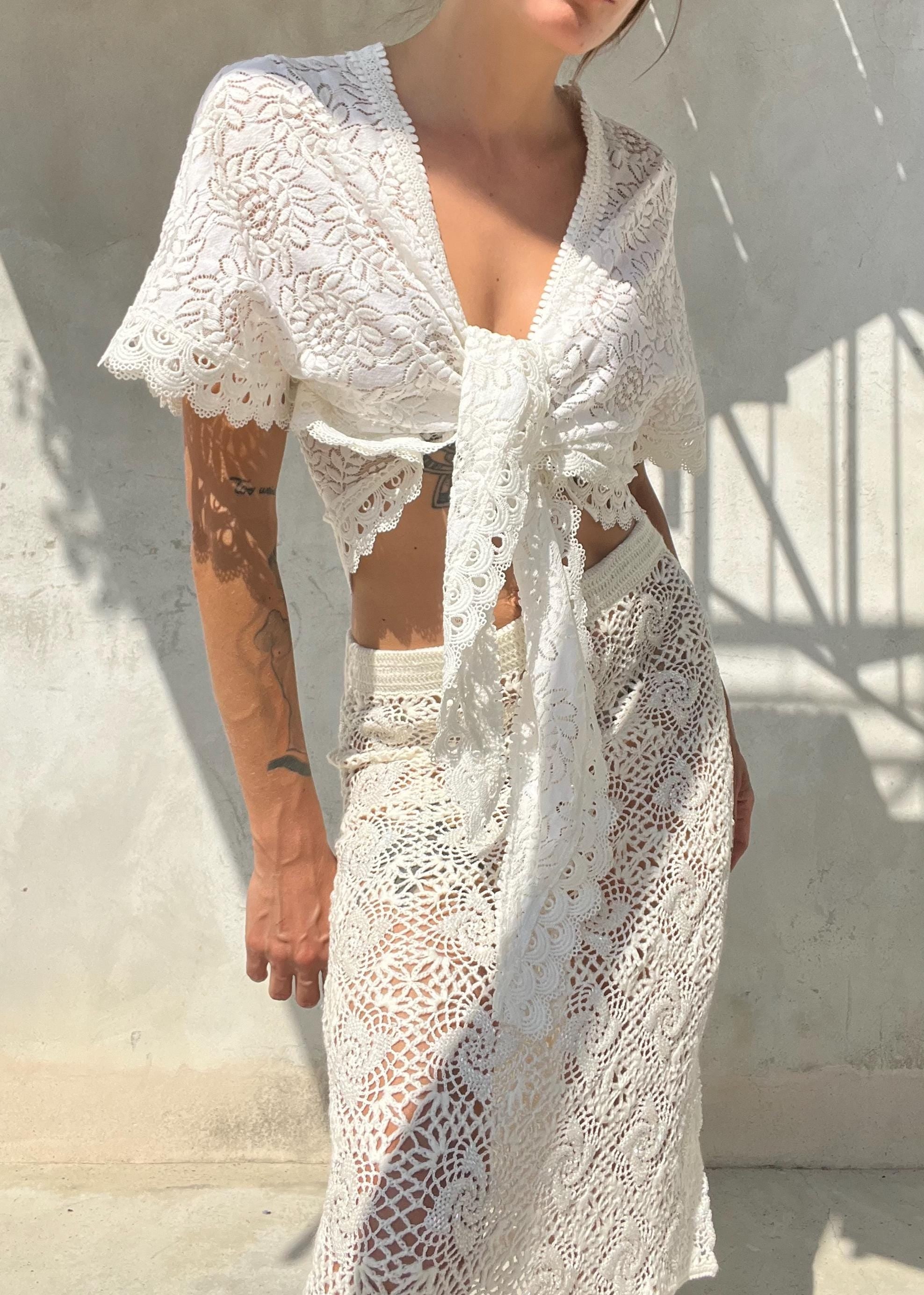 top in pizzo bianco con maniche