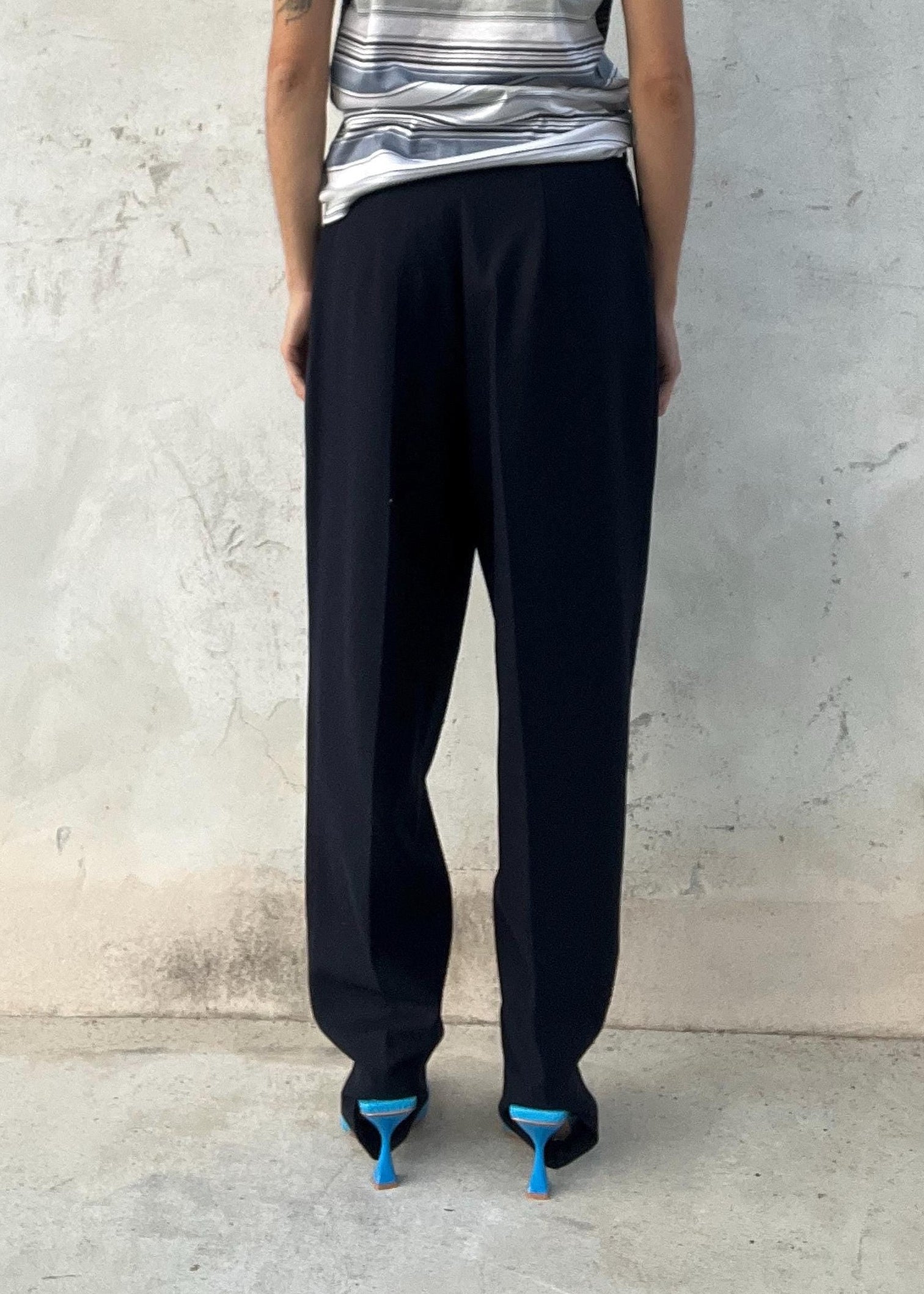 Pantaloni classici blu con ghetta