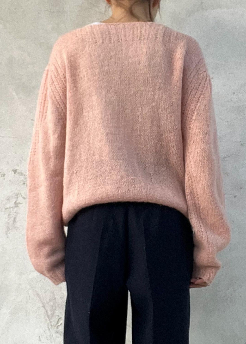 Cardigan vintage rosa con intreccio