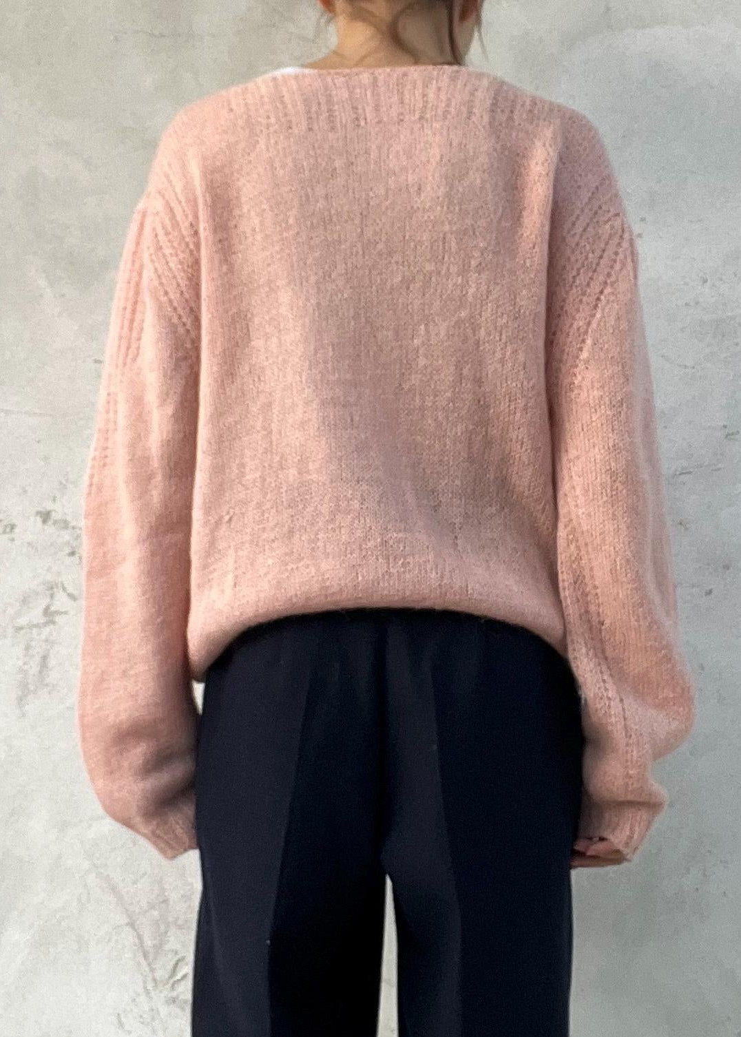 Cardigan vintage rosa con intreccio