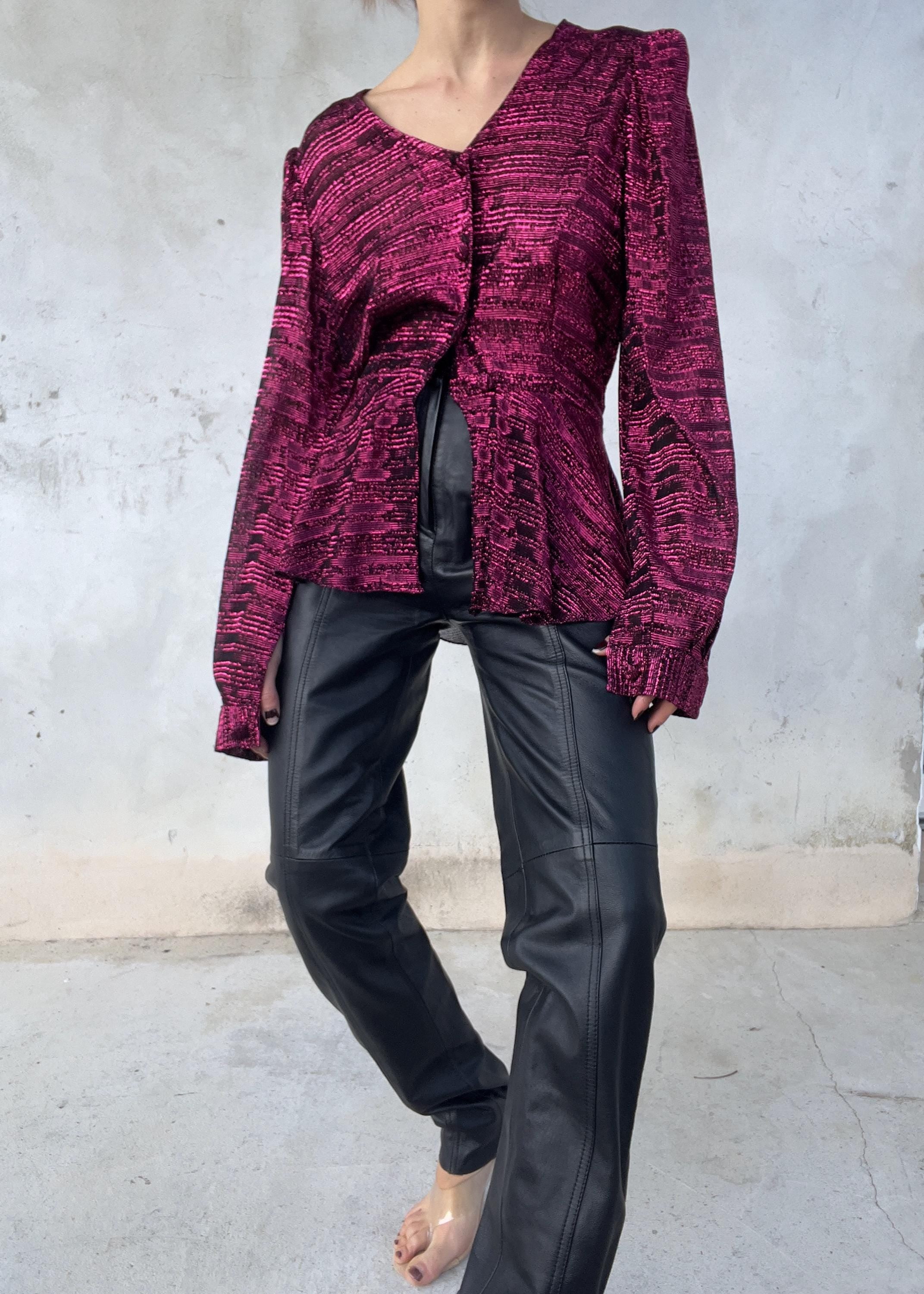 Pantaloni in pelle con zip