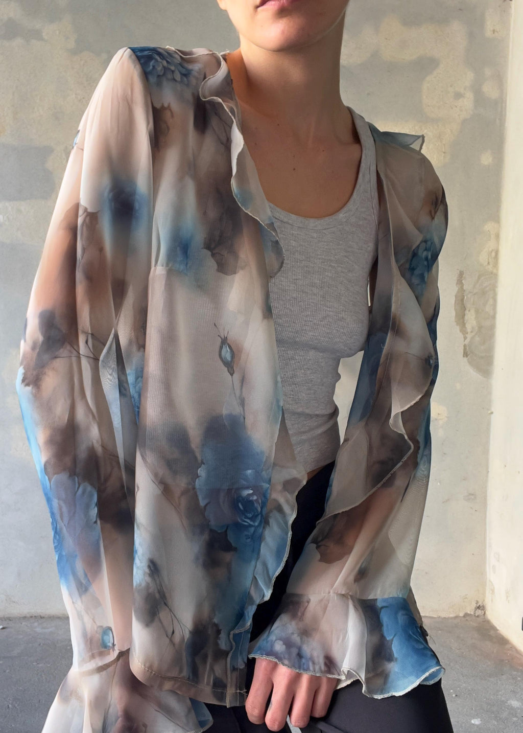 Top con ruffle e fiori