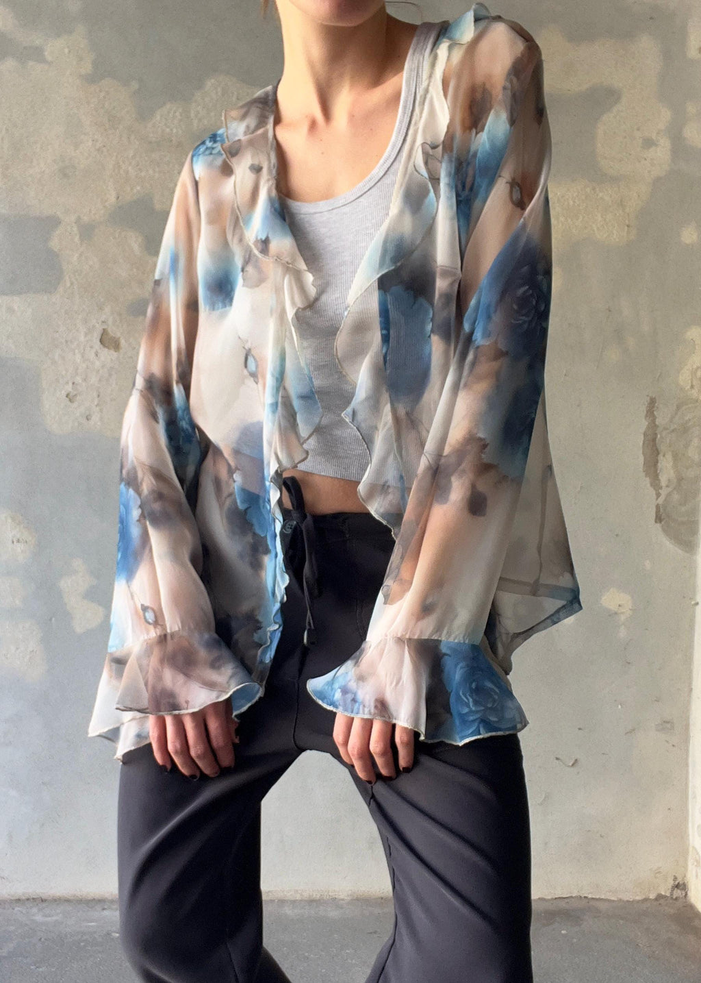 Top con ruffle e fiori